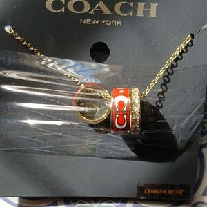 Coach Gold and Red 3 Ring Charm Necklace